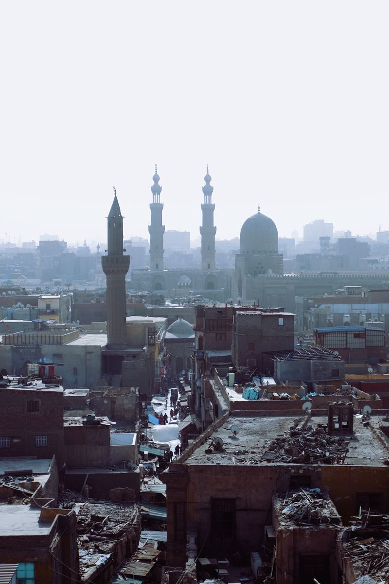 A captivating view of Cairo's urban skyline featuring historic minarets and rooftops.